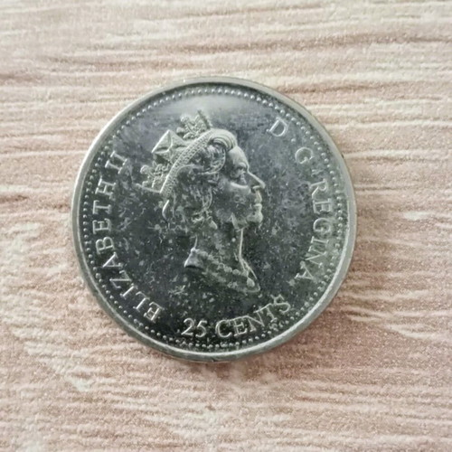 25 Cents Canada 2000 like new, made of nickel