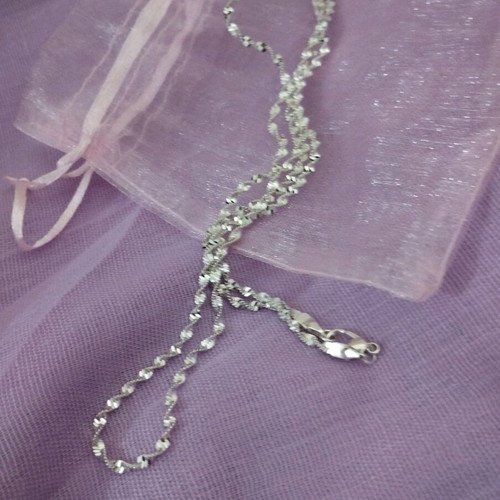 Twisted shiny silver chain new, approximately 60 cm long
