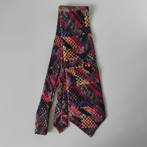 Vintage silk tie like new with geometric multicolor pattern
