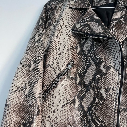 Please short leatherette jacket small like new, beige brown