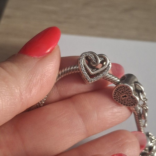 Pandora charm heart with linked hearts decorated with zircon stones, like new