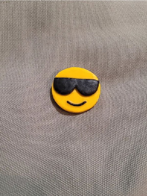 Polymer clay badge like new with smiling face and sunglasses