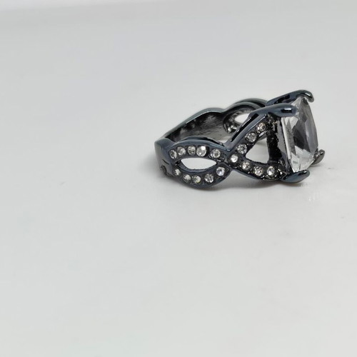 Black ring with large emerald cut crystal, like new