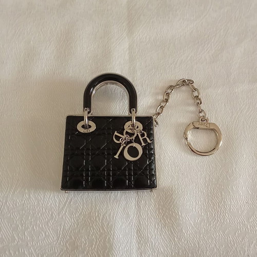 Christian Dior keychain with lipstick, like new, black and silver