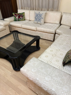 Sectional living room set used, three pieces with central and side tables
