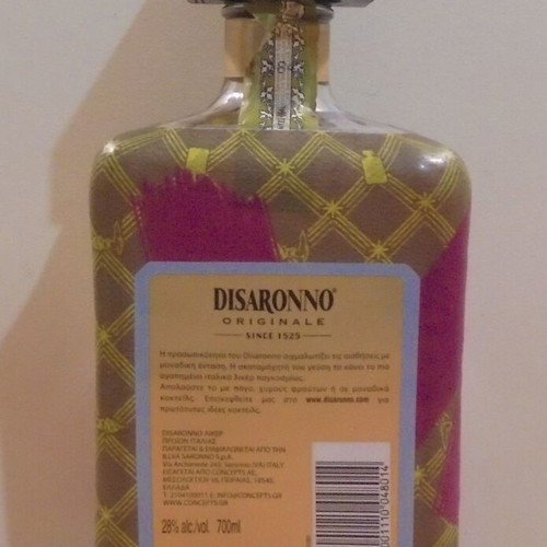 Disaronno Originale By Trussardi collectible empty bottle used