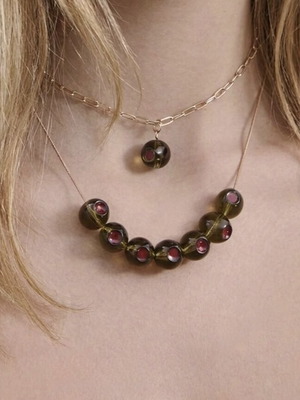Stradivarius necklace new, green and gold with olive design