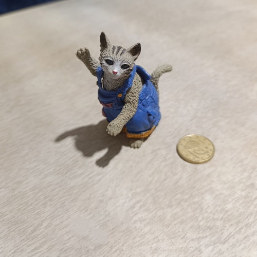 Cat figure with removable costume used