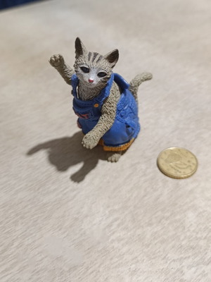 Cat figure with removable costume used