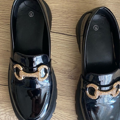 Women's loafers size 38 like new, black patent leather with gold buckle