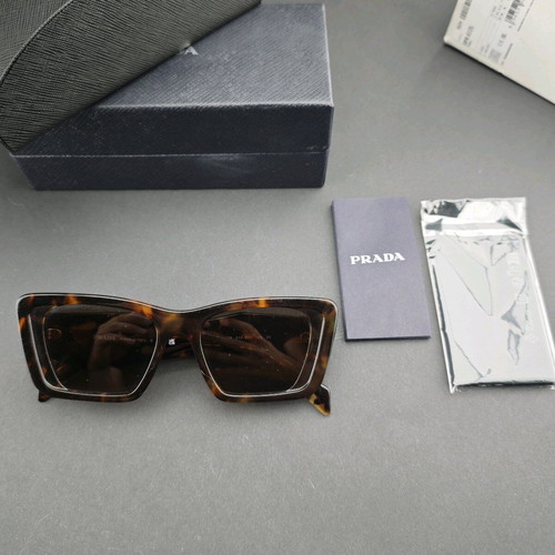 Prada sunglasses used with original box and case