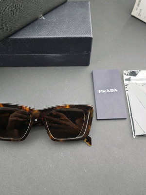 Prada sunglasses used with original box and case