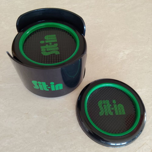 Coaster set of six plastic pieces with holder, like new
