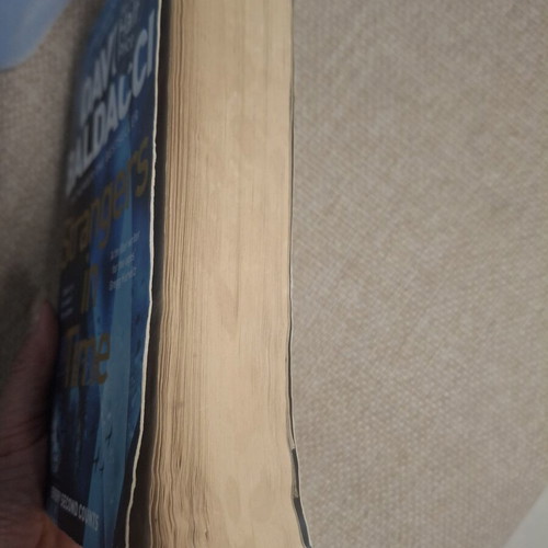 Strangers in Time by David Baldacci, historical thriller paperback