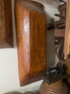Old wooden troughs made from single tree trunk used