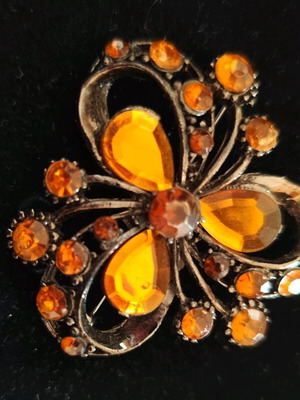 Butterfly pin like new, amber color