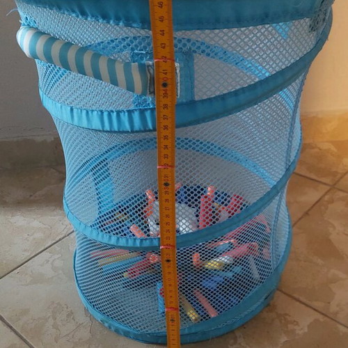 Foldable mesh storage basket with spring like new