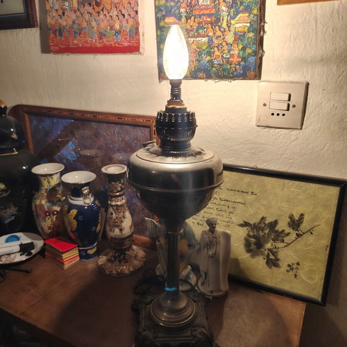 Lamp converted into adjustable light fixture