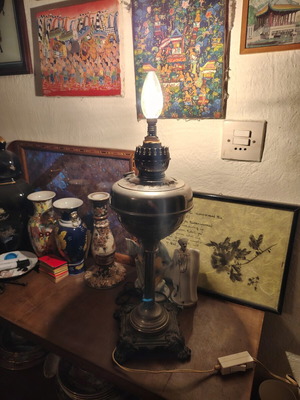 Lamp converted into adjustable light fixture