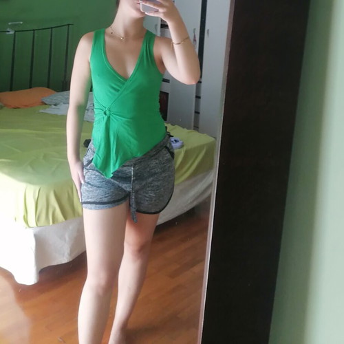 Green blouse with ring detail, size Small