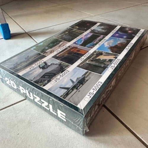 Two puzzles with 300 and 644 pieces, Chinese dragon relief and space planets