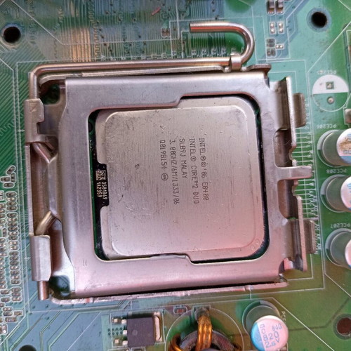 Intel DG31PR motherboard with Core 2 Duo E8400, 2GB DDR2 RAM, Cooler Master fan used