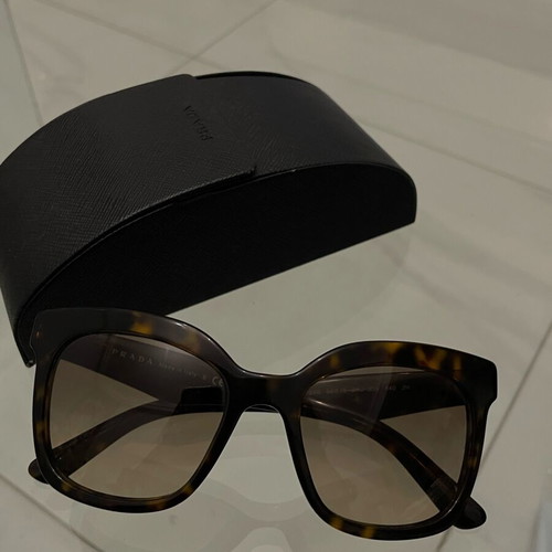 Prada SPR 24Q sunglasses used, brown tortoise design with case