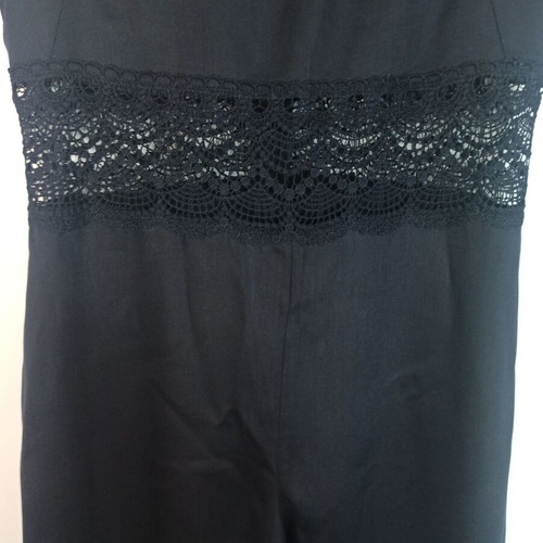 Regalinas black one-piece jumpsuit medium with perforated embroidery like new