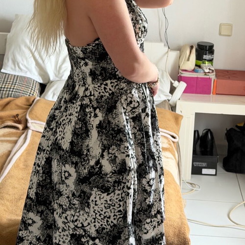 Vintage women's midi dress with halter neckline and black and white floral pattern used