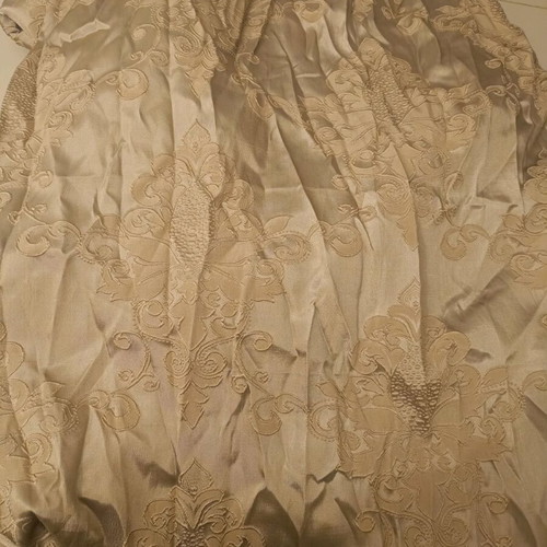 Curtain used with gold trim