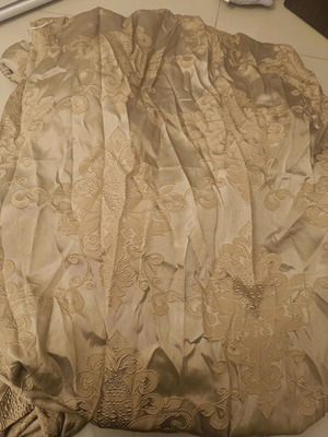 Curtain used with gold trim