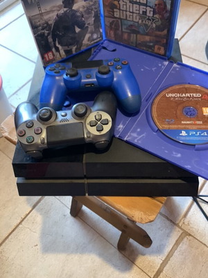 PlayStation 4 console 1TB used with 2 controllers and 3 games