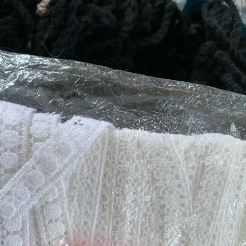 Set of threads, lace and ribbons for sewing used