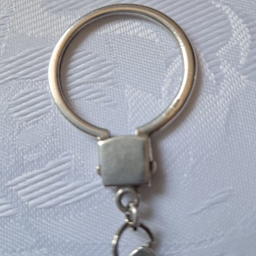 Silver keychain like new, 4.5cm key with 3cm round 925 charm