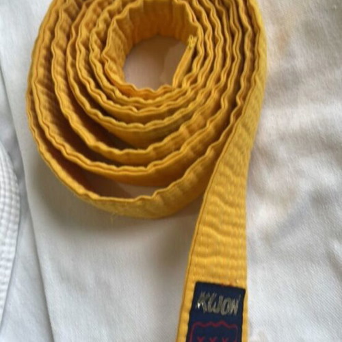 Martial arts pants used with white and yellow belt for adults