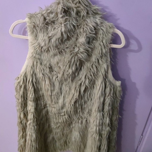 Asymmetric fur vest used, beige and sugar shades
