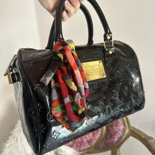 Louis Vuitton old black bag with gold accessories