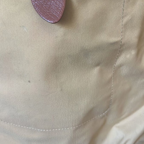 Longchamp backpack used beige with replaced zipper and minor defects