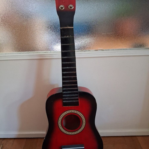 Children's wooden guitar 58 cm used, missing strings