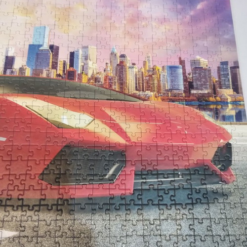 Puzzle 500 pieces with car theme like new