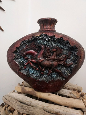 Decorative vase like new with two sides and relief designs