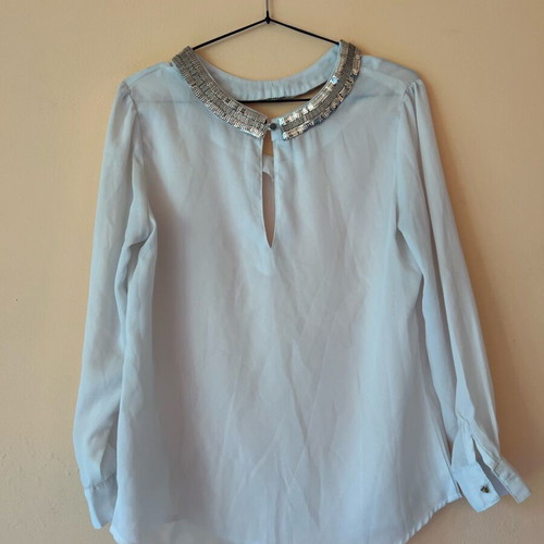 White blouse with silver details around neckline size M like new