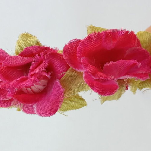 Children's tiara used with pink and green roses