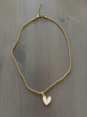 Necklace with heart design like new, white and gold