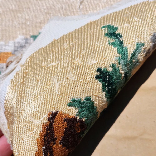 Vintage needlepoint with embroidered daisy bouquet used