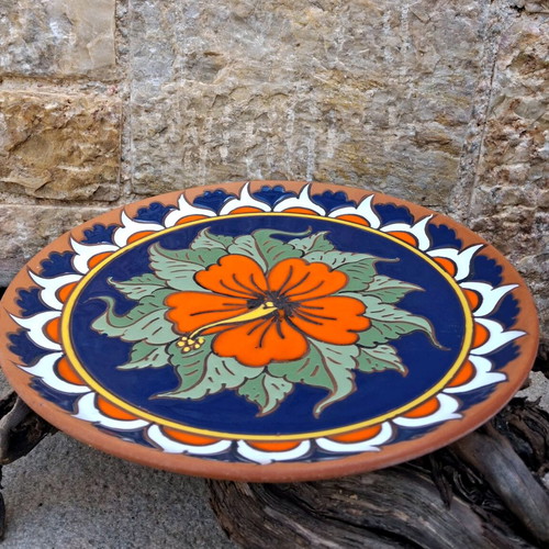 Vintage handmade Rodos ceramic plate with hibiscus motif like new