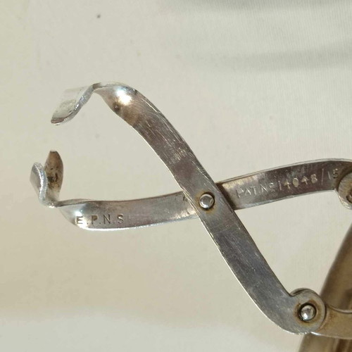 Antique English handmade sugar bowl from 1920s with silver-plated lid and tongs