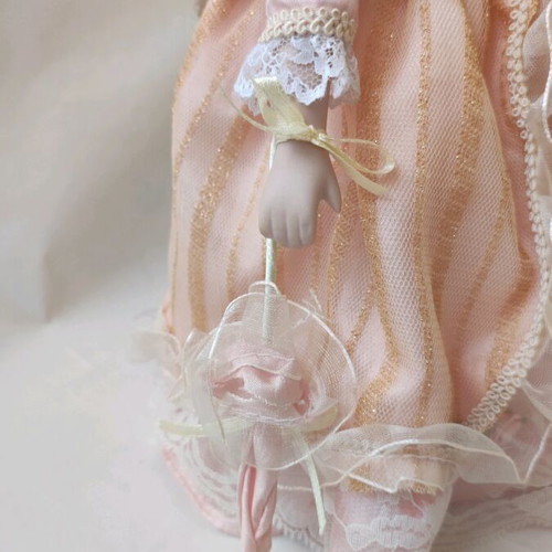 Porcelain dolls used, set of 2 with clothes and accessories