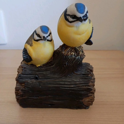 Two decorative birds like new