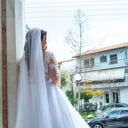 Wedding dress like new with hoop skirt and veil, size L-XL from Atelier Marina Galani